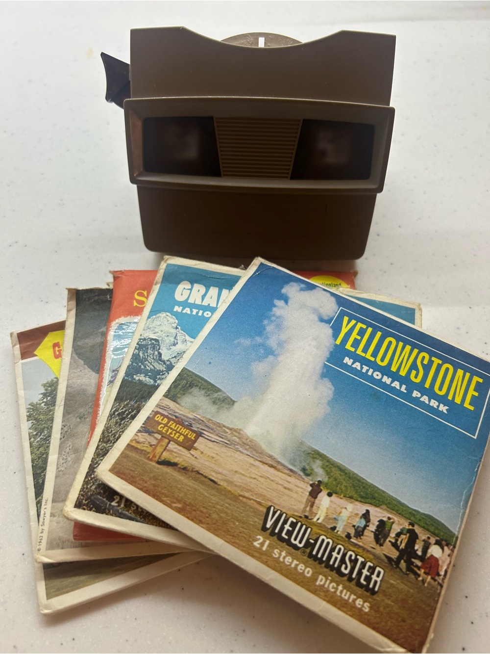 A vintage Sawyer's View-Master Model G 3D stereoscope viewer with reels